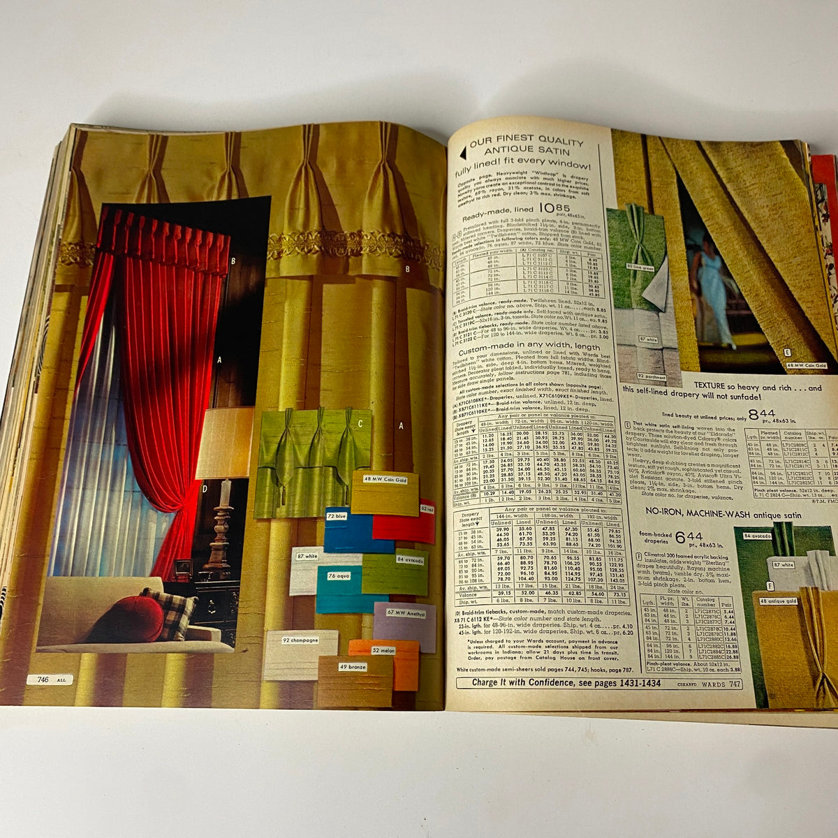 1969 Montgomery Ward Fall and Winter Catalog featuring home decor options with elegant curtains and drapery, showcasing rich colors and textures.