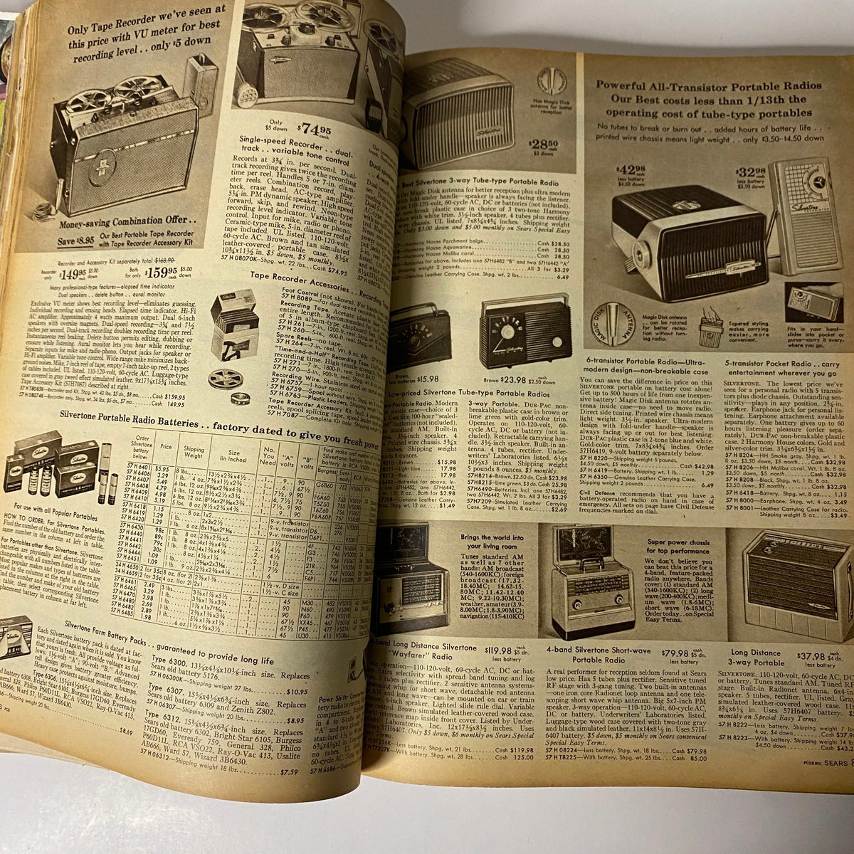 1958 Sears, Roebuck and Co. Spring and Summer Catalog page featuring a range of portable radios, showcasing vintage electronics from the mid-century era.