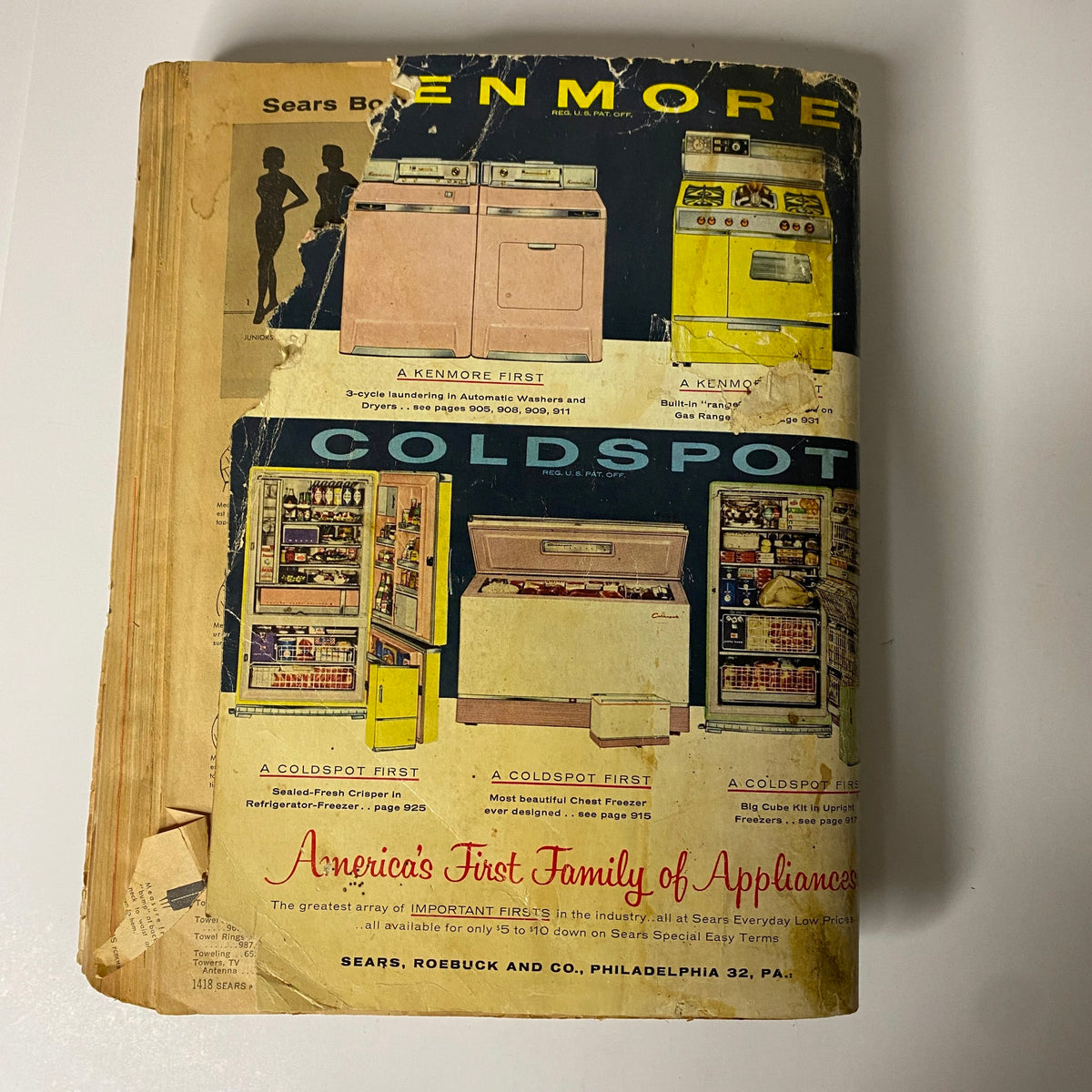 1958 Sears, Roebuck and Co. Spring and Summer Catalog cover featuring vintage advertising for Kenmore appliances and Coldspot refrigerators, showcasing mid-century design.