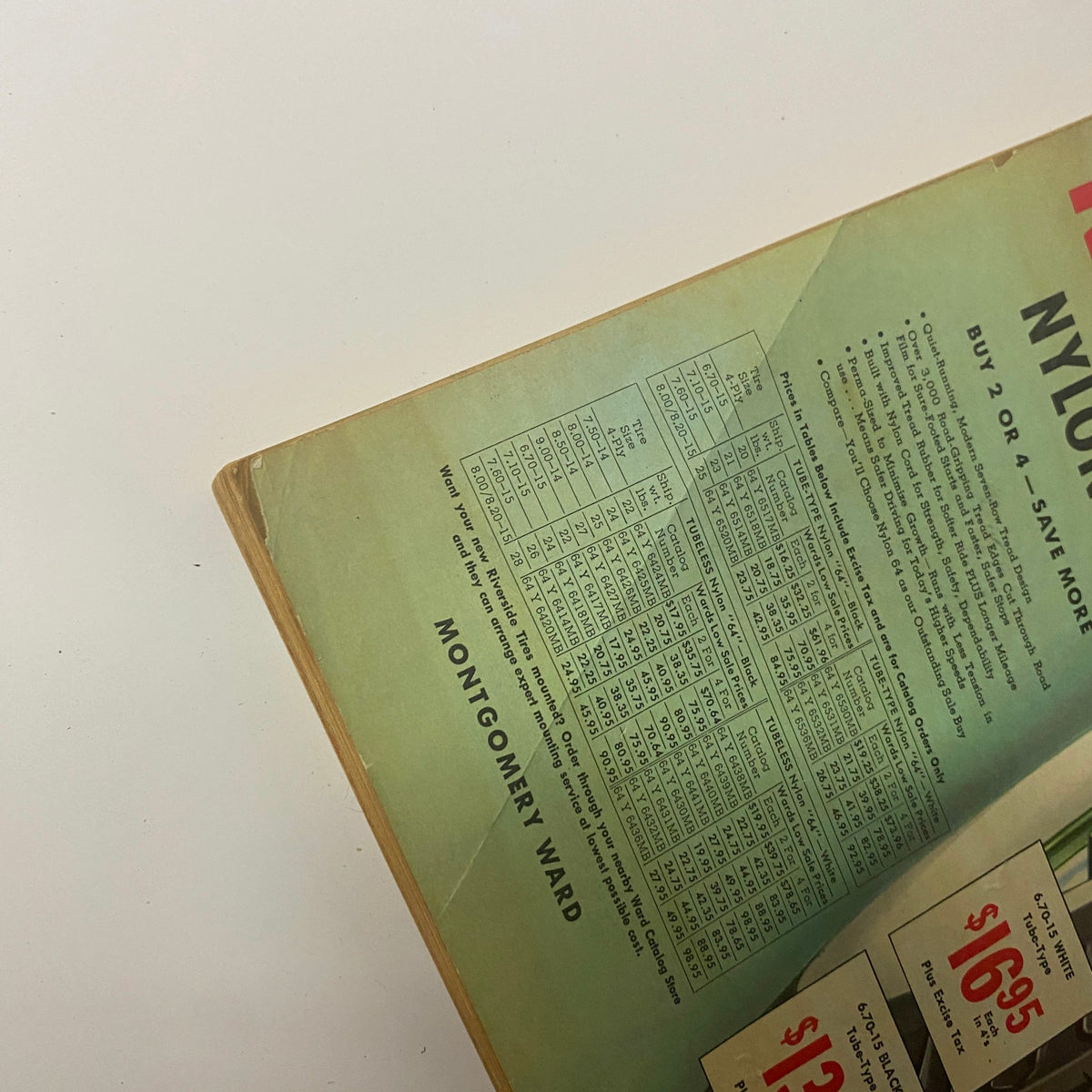Detail of pricing information on the back cover of the 1961 Montgomery Ward Summer Catalog, focused on Riverside Nylon tire sizes and costs.