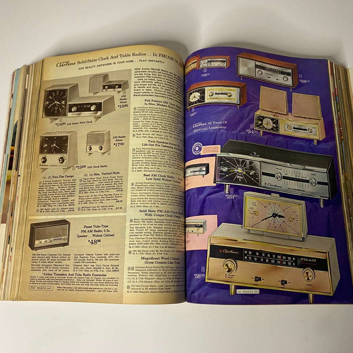 Vintage magazine page showcasing Airline solid-state clock and table radios from the 1965 Montgomery Ward Fall and Winter Catalog, featuring prices and descriptions.