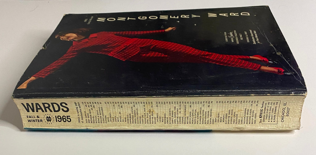 Side view of the 1965 Montgomery Ward Fall and Winter Catalog showcasing its vintage design, featuring a model in a red patterned outfit. This collectible magazine highlights fashion trends from the mid-1960s.