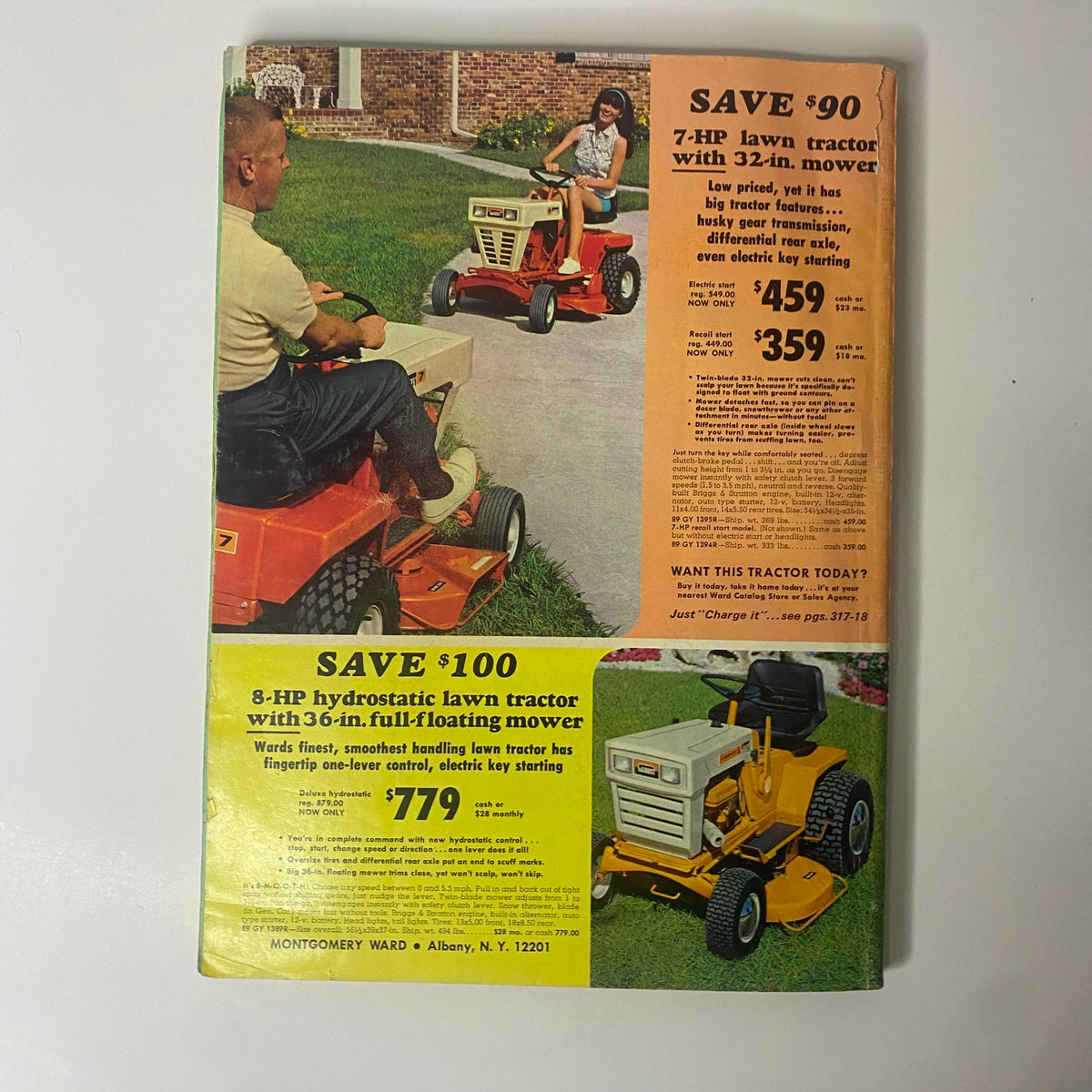 Back cover of the 1970 Montgomery Ward Summer Catalog advertising lawn tractors with savings highlighted, showing a man and a girl riding lawn tractors in a yard.