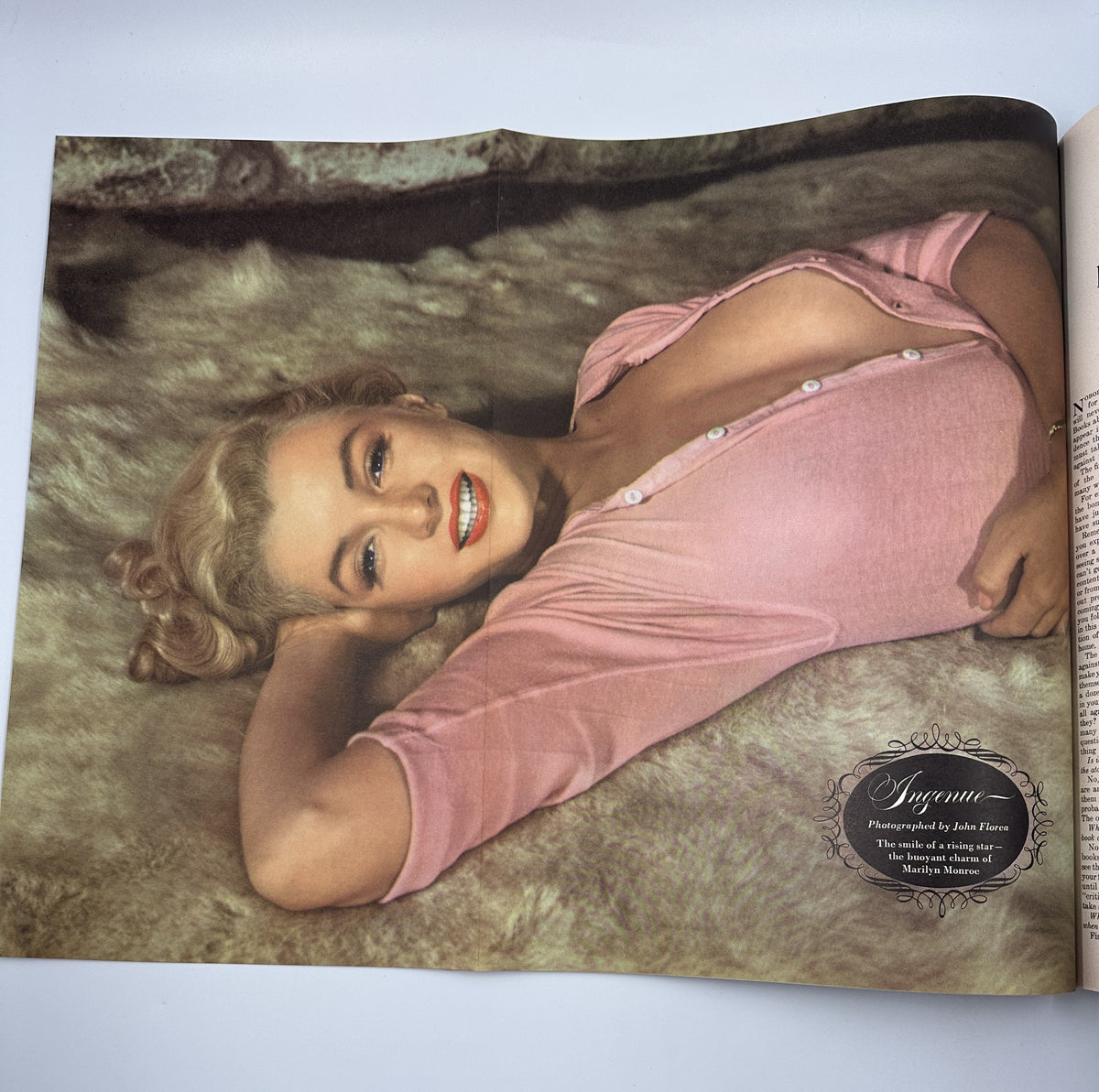 Full-page spread from Esquire Magazine September 1951, featuring Marilyn Monroe in a captivating posed photograph, designed to highlight vintage pinup art.
