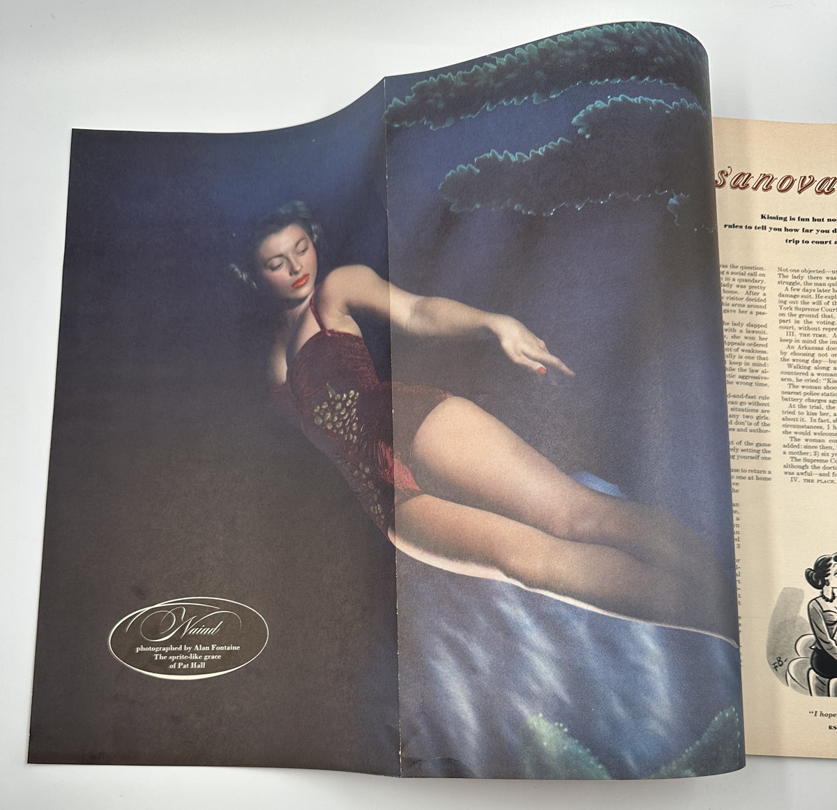 Double page from Esquire Magazine November 1951 displaying a glamorous pinup photograph along with an article about Casanova.