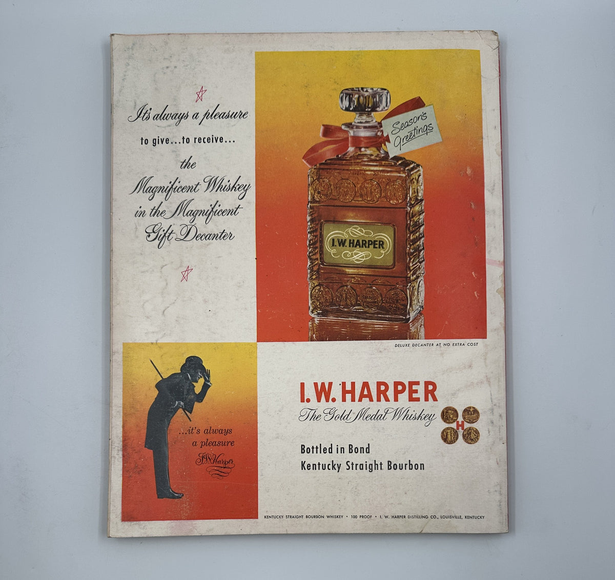 Esquire Magazine December 1951 featuring an advertisement for I.W. Harper whiskey, highlighting the luxurious whiskey in a showcase bottle as a gift idea.