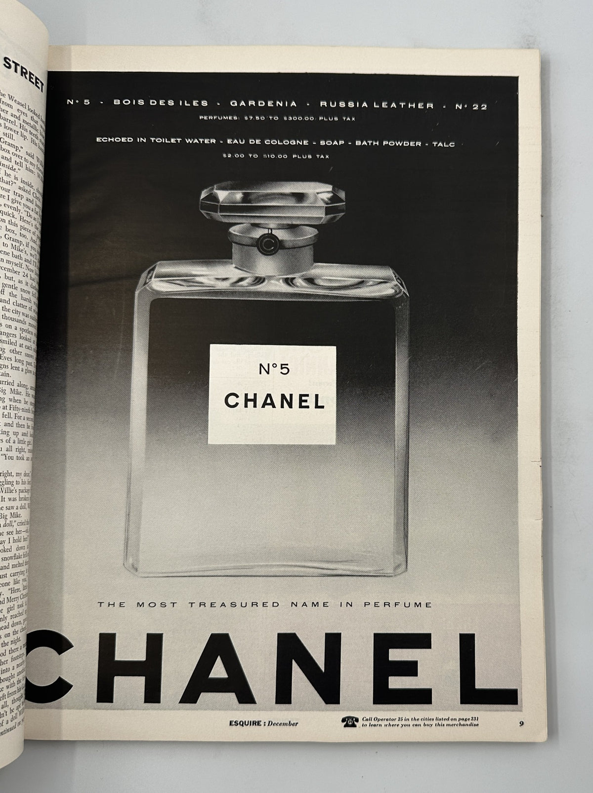 Chanel No. 5 advertisement from December 1954 Esquire Magazine, highlighting the iconic perfume with its distinctive bottle.