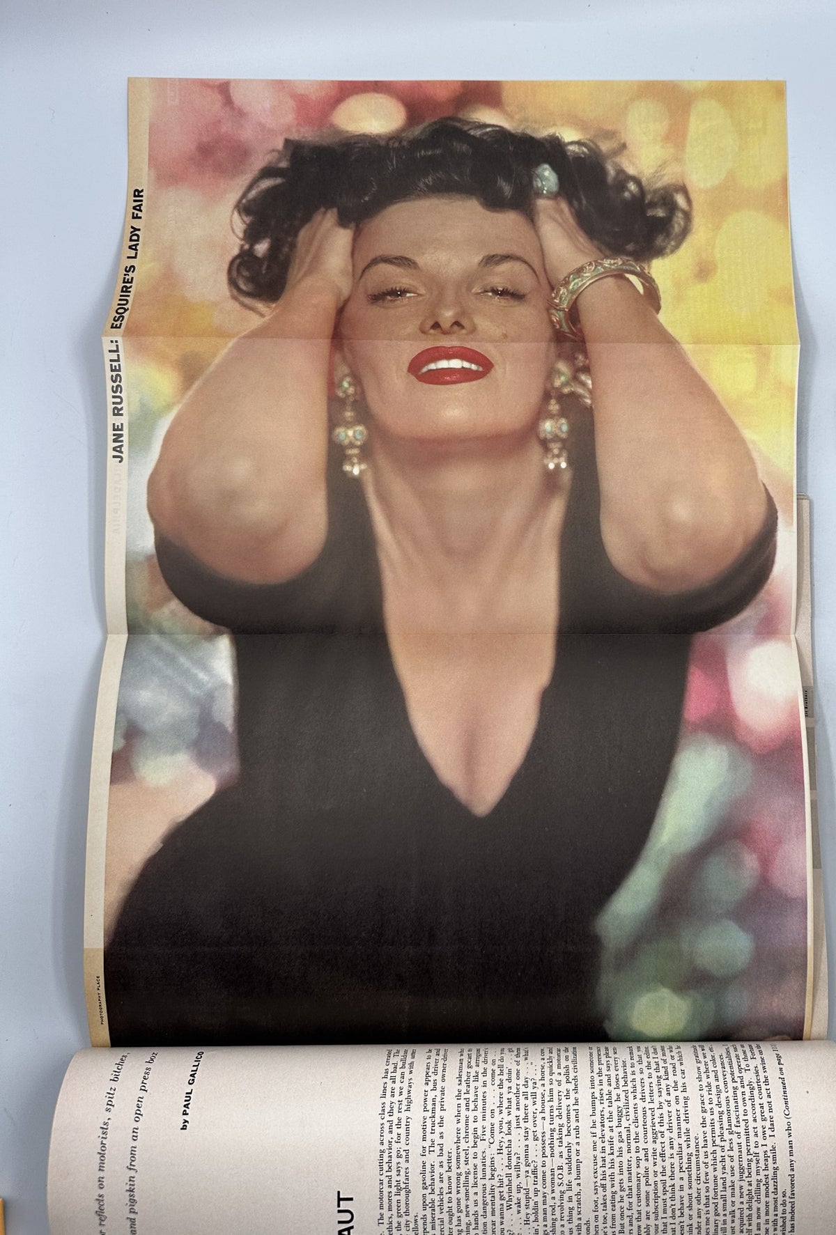 Esquire Magazine November 1954 features a vibrant foldout image of actress Jane Russell, showcasing her glamorous style and captivating pose.
