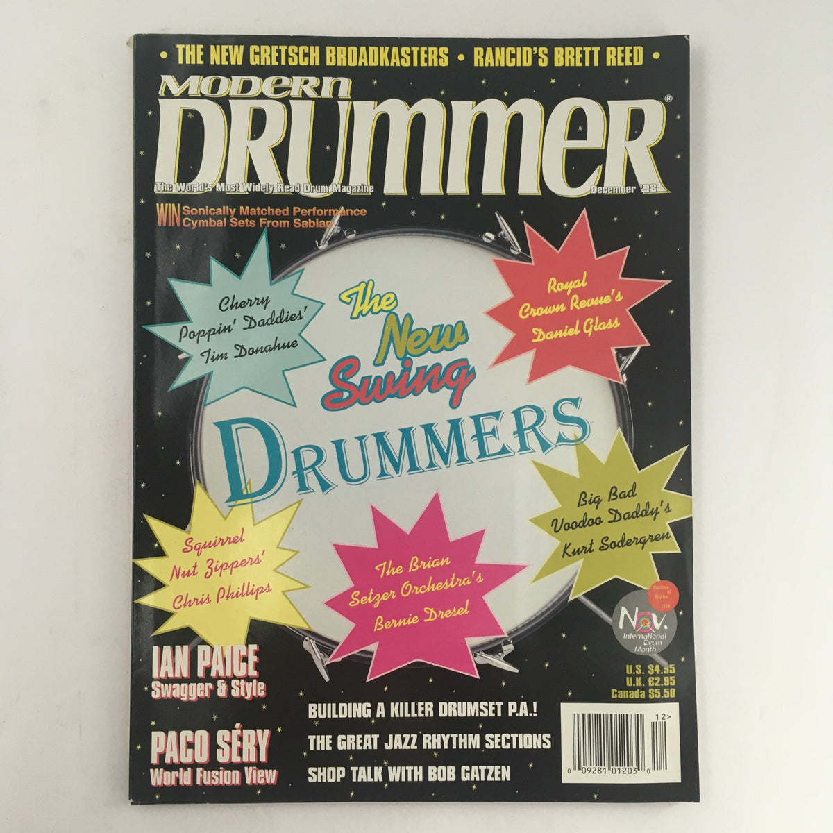 Cover of Modern Drummer Magazine December 1998 featuring stand-out items including: 'The New Swing Drummers,' articles on Brett Reed, Chris Phillips and Bernie Dresel, and mentions of various prominent musicians and drumming techniques.