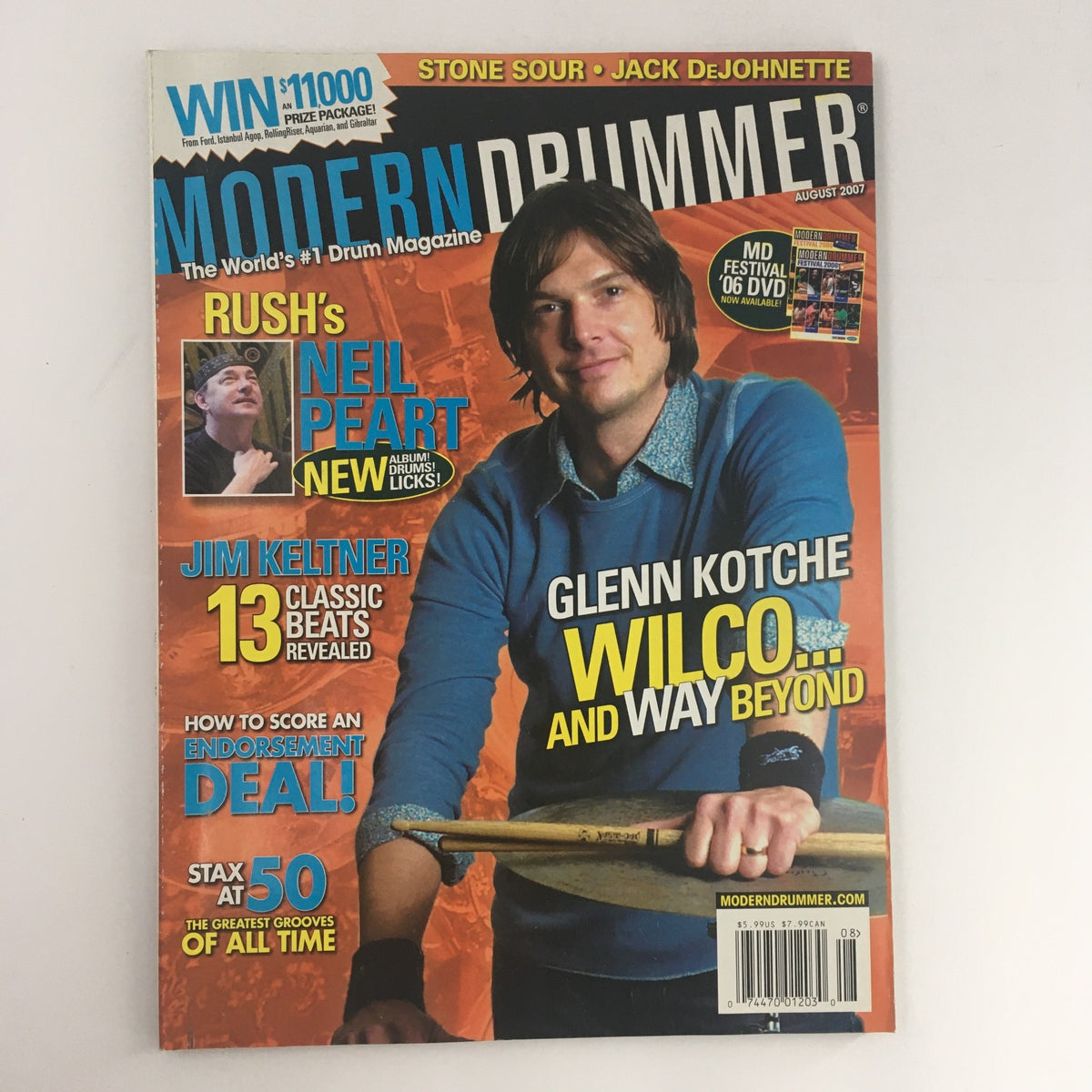 Modern Drummer Magazine August 2007 featuring Neil Peart, Glenn Kotche, and Jim Keltner on the cover, showcasing insights from legendary drummers.