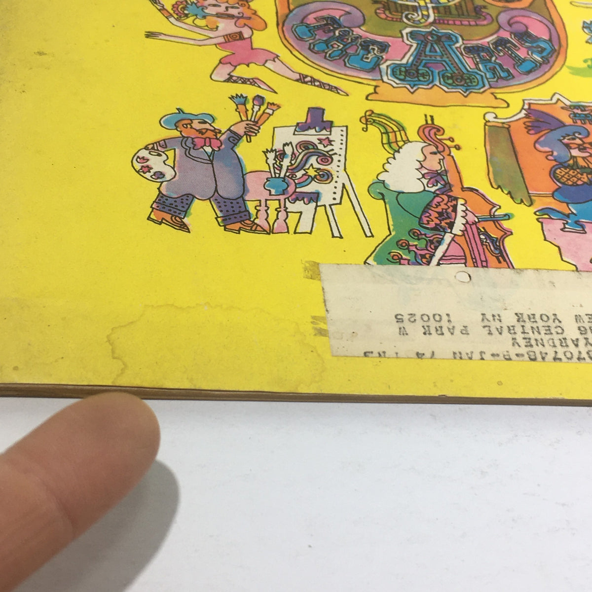 Detailed view of the cover of Cue Magazine: August 21 1971 - Business and The Arts showcasing vibrant illustrations of artistic figures and a label on the cover, highlighting the magazine's artistic theme.