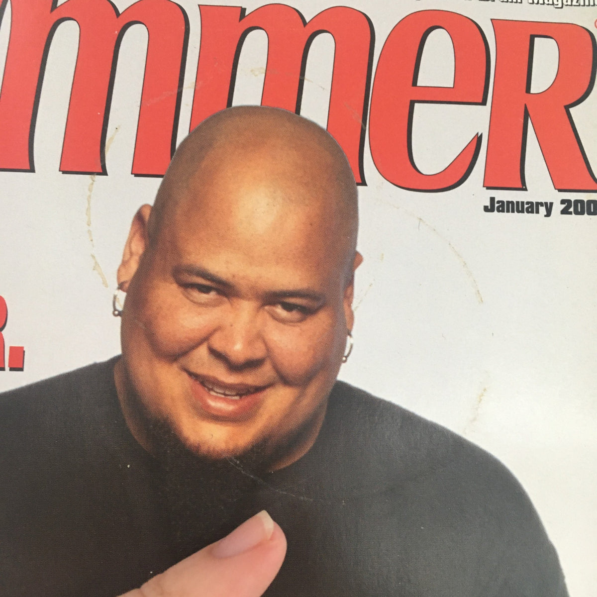 Close-up of Abe Laboriel Jr. on the cover of Modern Drummer Magazine January 2003, showcasing his charismatic presence and drumming expertise.