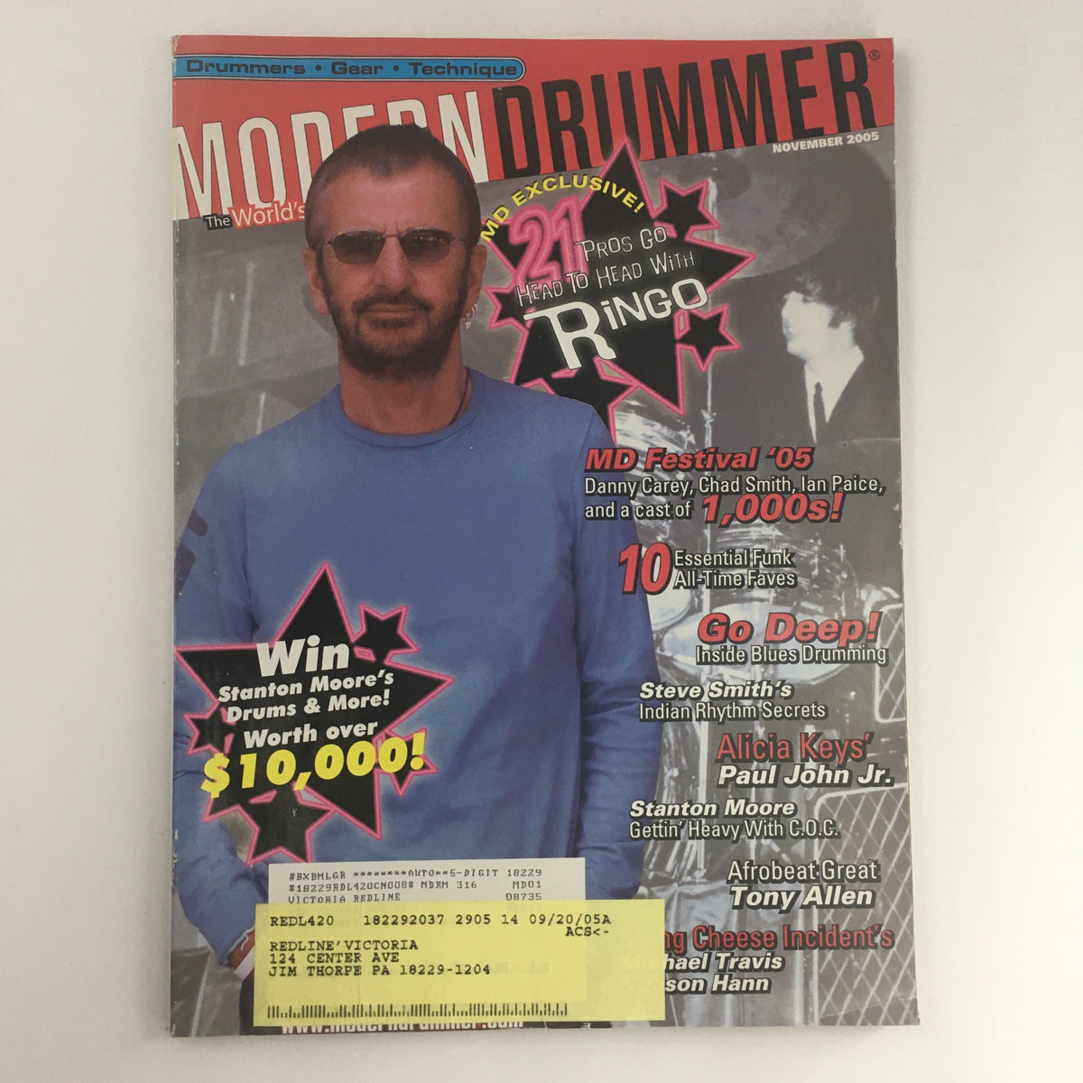 Modern Drummer Magazine November 2005 cover featuring Ringo Starr, showcasing contents about legendary drummers including Paul John Jr. and Tony Allen. Includes a promotional section and a prize giveaway.