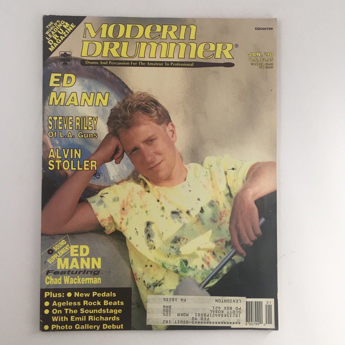 Modern Drummer Magazine January 1990 edition featuring Ed Mann, Steve Riley of L.A. Guns, and Alvin Stoller on the cover. This vintage magazine showcases influential drummers and percussion techniques.