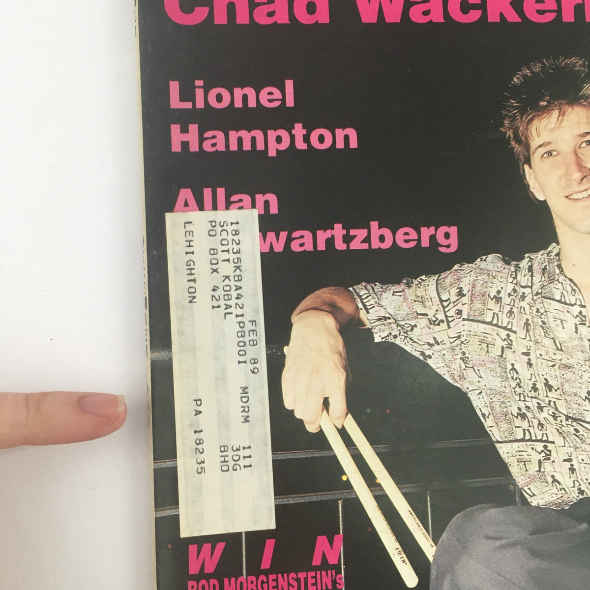 Close-up of the December 1988 Modern Drummer Magazine cover featuring Chad Wackerman, with details of the address label and drumsticks, highlighting its collectible nature.
