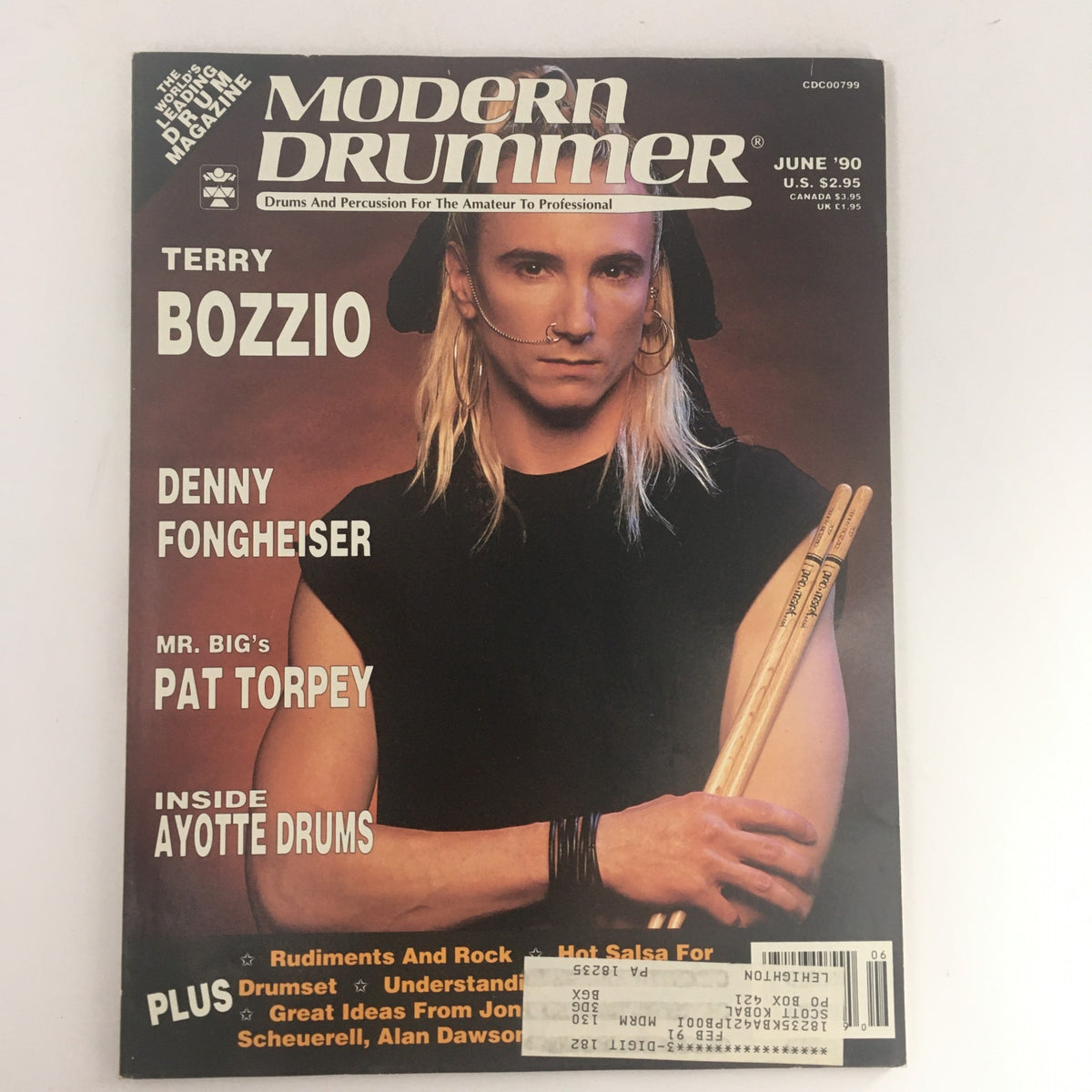 Modern Drummer Magazine June 1990 featuring Terry Bozzio, Denny Fongheiser, and Pat Torpey on the cover, showcasing their talents in the drumming world.