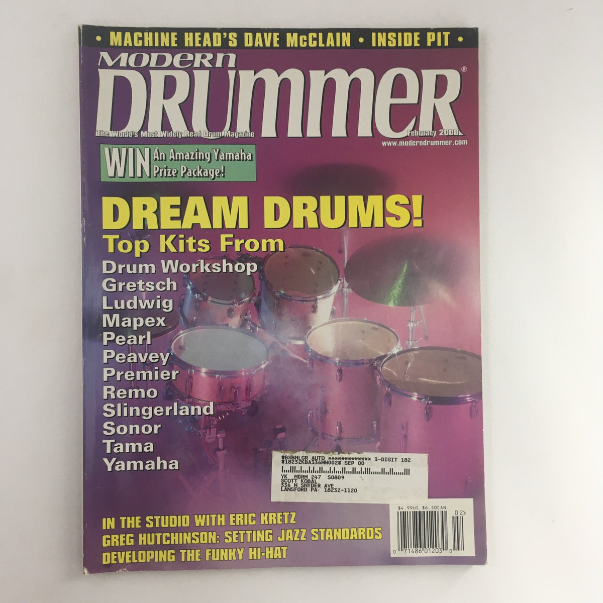 Cover of Modern Drummer Magazine February 2000 featuring Dave McLain, highlighting drum kits, and the text 'Dream Drums! Top Kits From' along with details about artists including Eric Kretz and Greg Hutchinson.