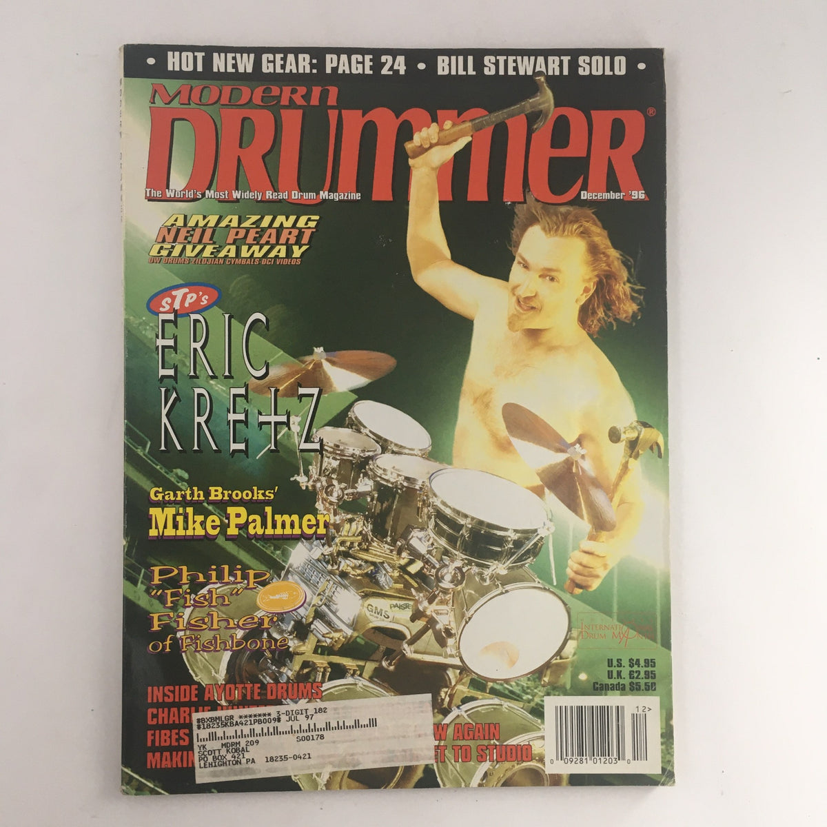 Modern Drummer Magazine December 1996 cover featuring Eric Kretz with drum kit and feature articles on Mike Palmer and Philip Fisher.