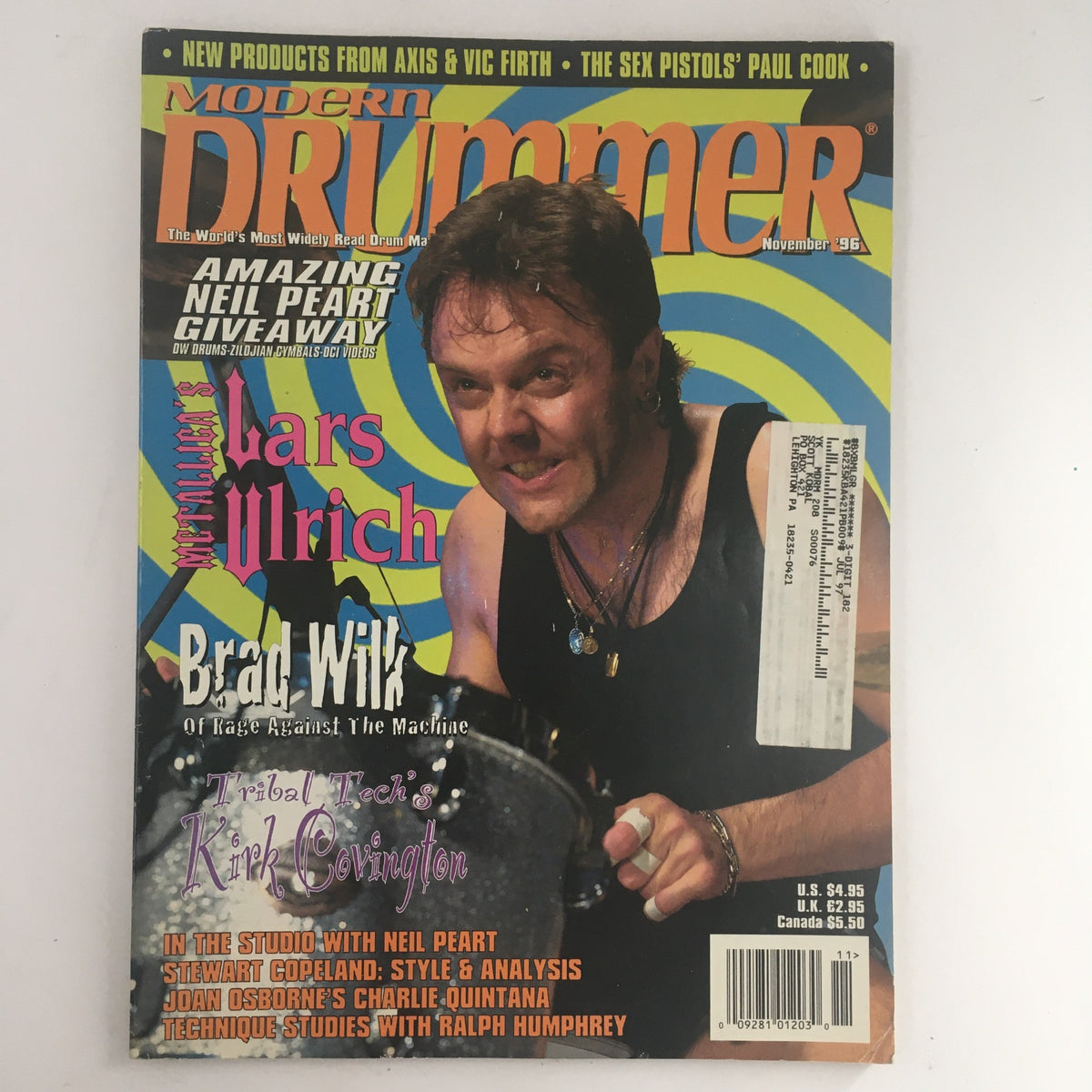 Cover of Modern Drummer Magazine November 1996 featuring Lars Ulrich, Brad Wilk, and Neil Peart. Highlights include the magazine's vibrant design and prominent text.