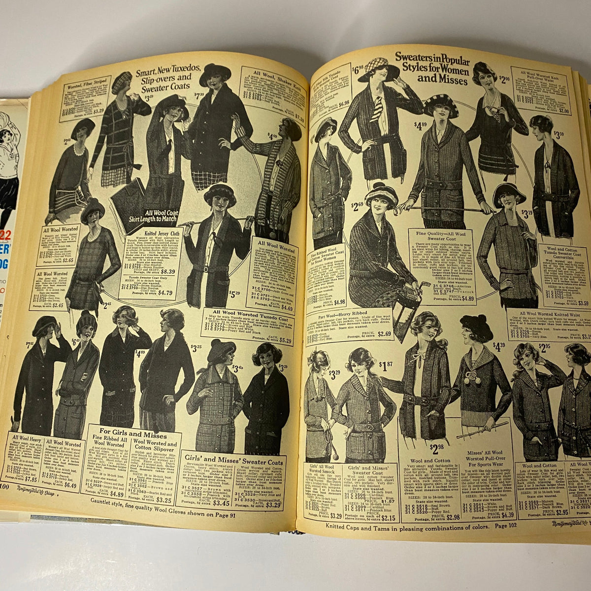 Sweaters and popular styles for women and misses illustrated in the 1922-1923 Montgomery Ward Fall and Winter Catalog No. 97, showing various designs and prices.