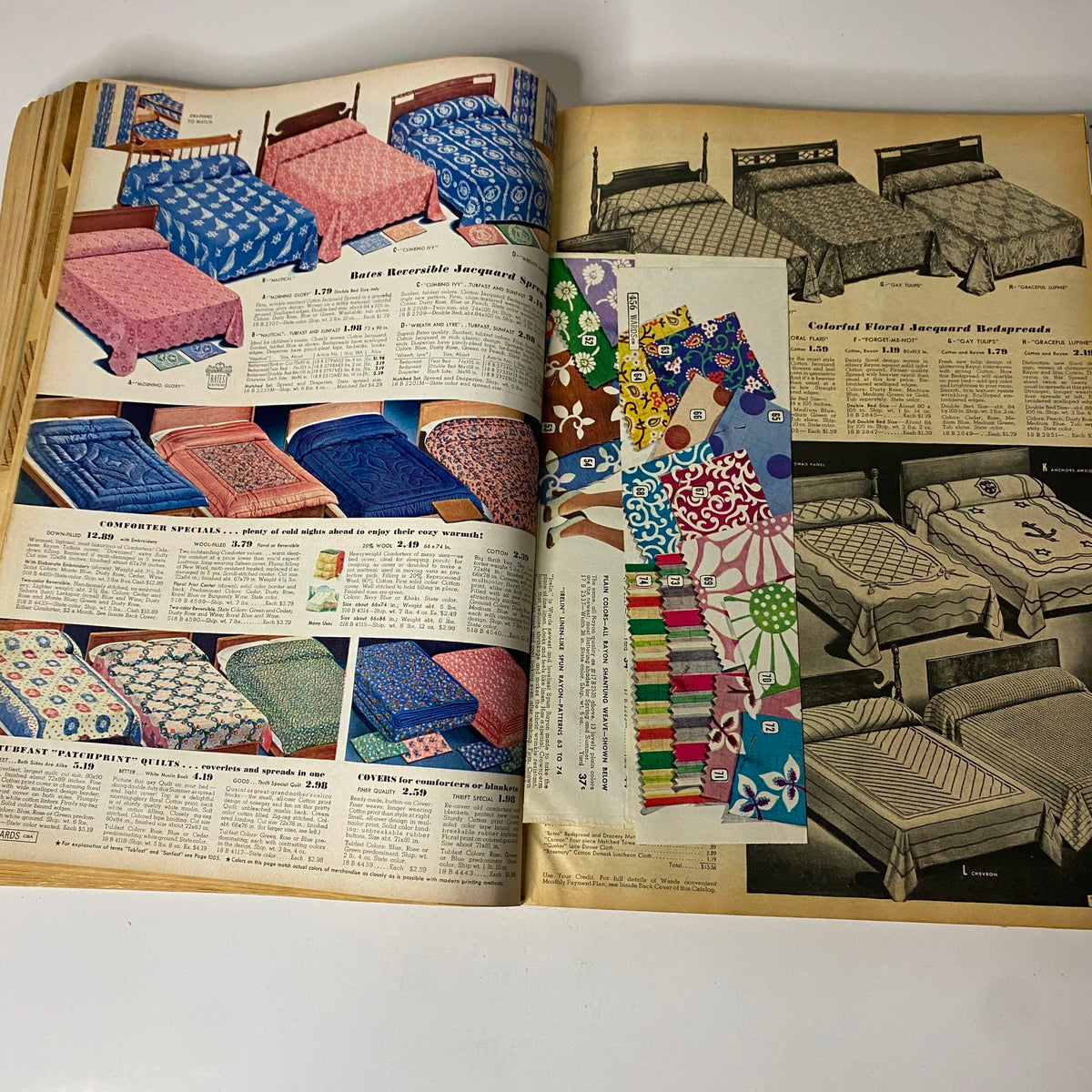 1942 Montgomery Ward Spring and Summer Catalog displaying patterns of reversible jacquard spreads and colorful bed coverings, highlighting vintage bedding styles and prices.