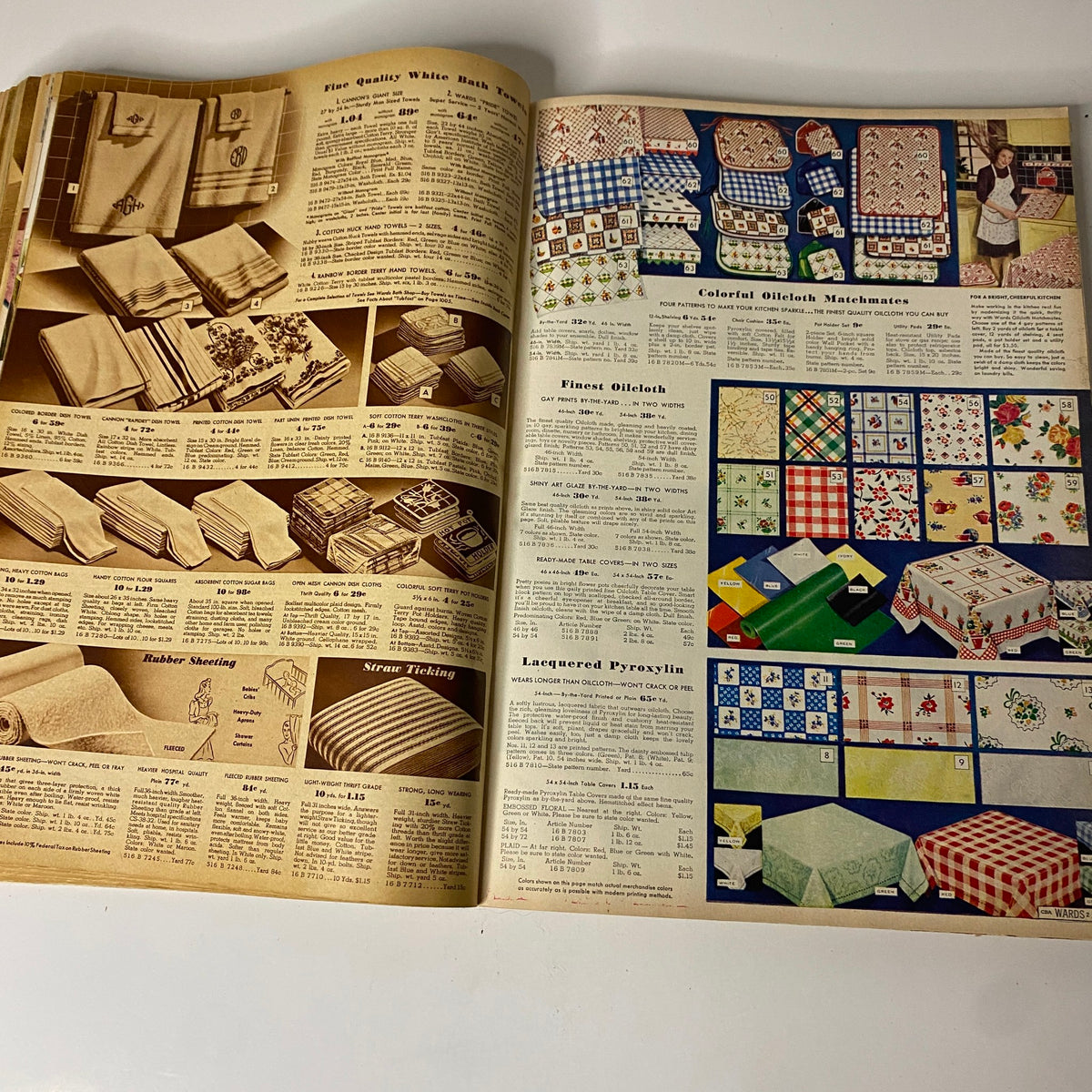 1942 Montgomery Ward Spring and Summer Catalog demonstrating a selection of fine quality bath towels and colorful oilcloth table coverings, emphasizing 1940s household textiles.