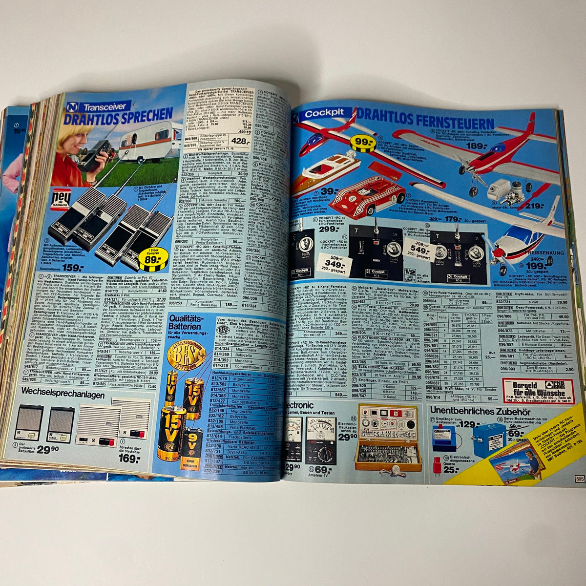 1975 Neckermann Spring and Summer Catalog presenting a variety of electronic gadgets including remote-controlled toys and communication devices with detailed pricing.