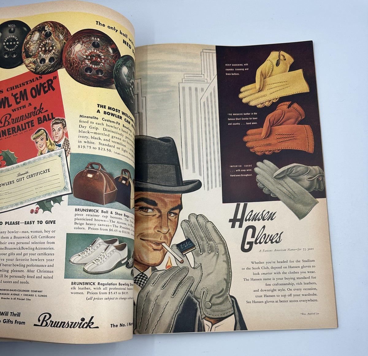Esquire Magazine December 1946 Christmas Annual Holiday Issue displaying an advertisement for Brunswick Gloves with a stylish man holding a glove.