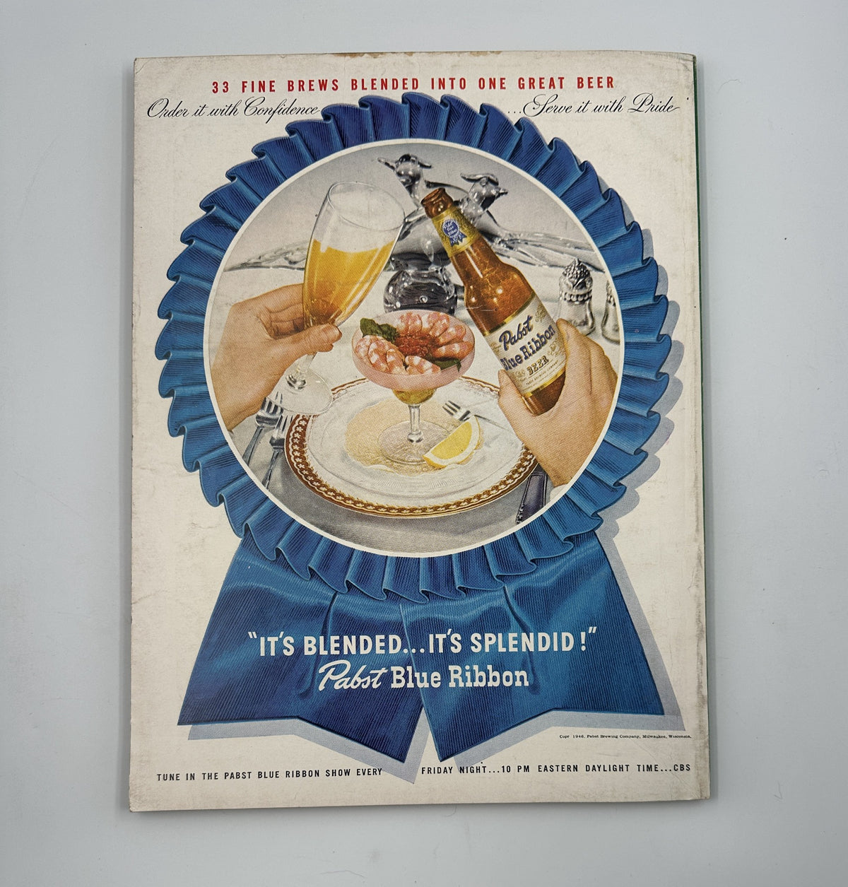 Esquire Magazine September 1946 featuring an advertisement for Pabst Blue Ribbon beer, highlighting a lavish presentation of food and drinks with the slogan 'It's Blended... It's Splendid!'.