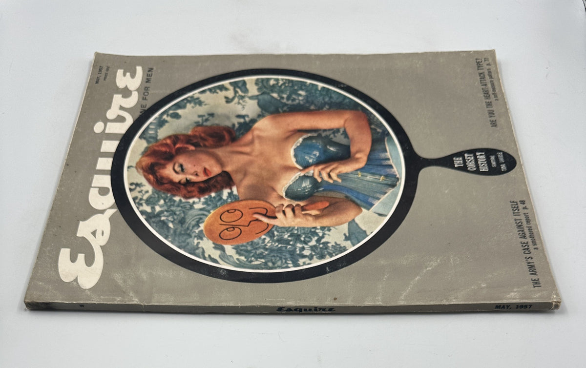 Another view of the May 1957 Esquire Magazine cover showcasing Tina Louise in a corset, highlighted with the article titles including 'The Army’s Case Against Itself' and 'Are You the Heart-Attack Type?'.