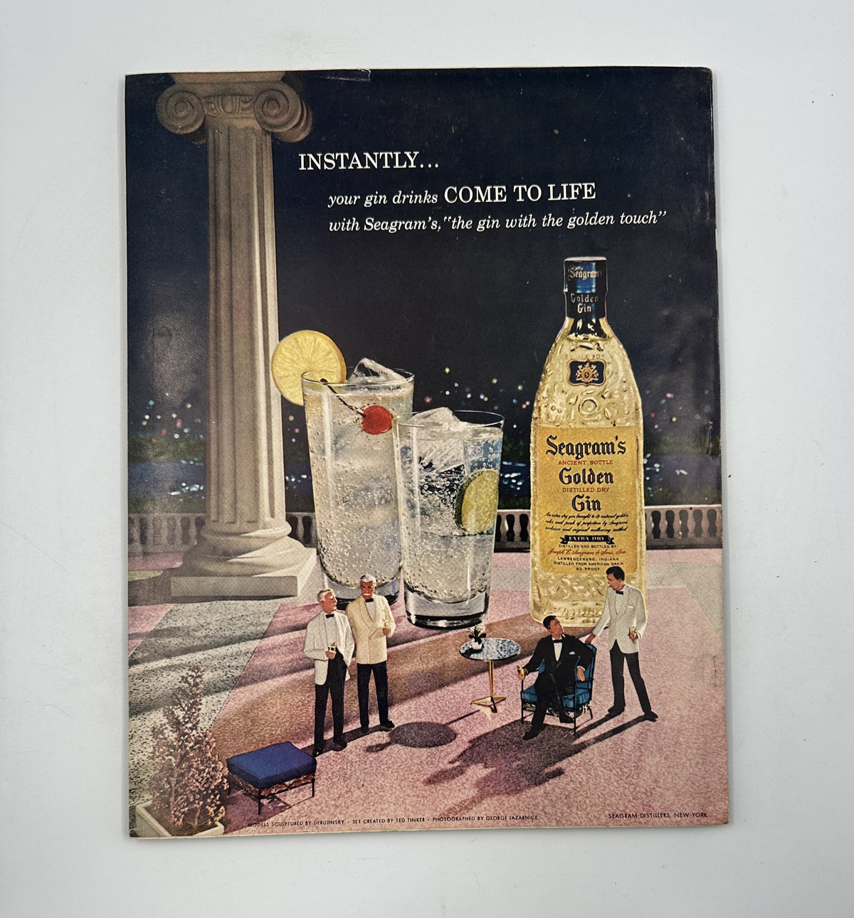 Advertisement for Seagram's Golden Gin showcasing gin drinks against an elegant backdrop, featured in Esquire Magazine, July 1957.
