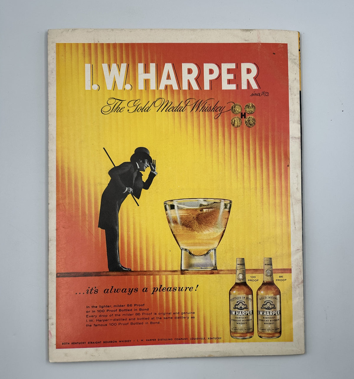 I.W. Harper whiskey advertisement from Esquire Magazine February 1958, featuring a stylish illustration.