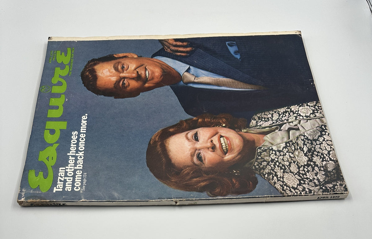 Esquire Magazine April 1970 cover featuring Tarzan and heroes alongside prominent figures. The magazine showcases a vintage design with bold green title text.