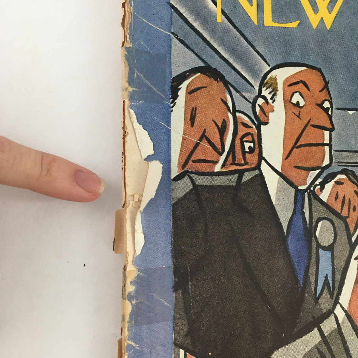 Detailed view of the spine of The New Yorker September 20 1952 magazine showing wear and tear, highlighting its vintage character.