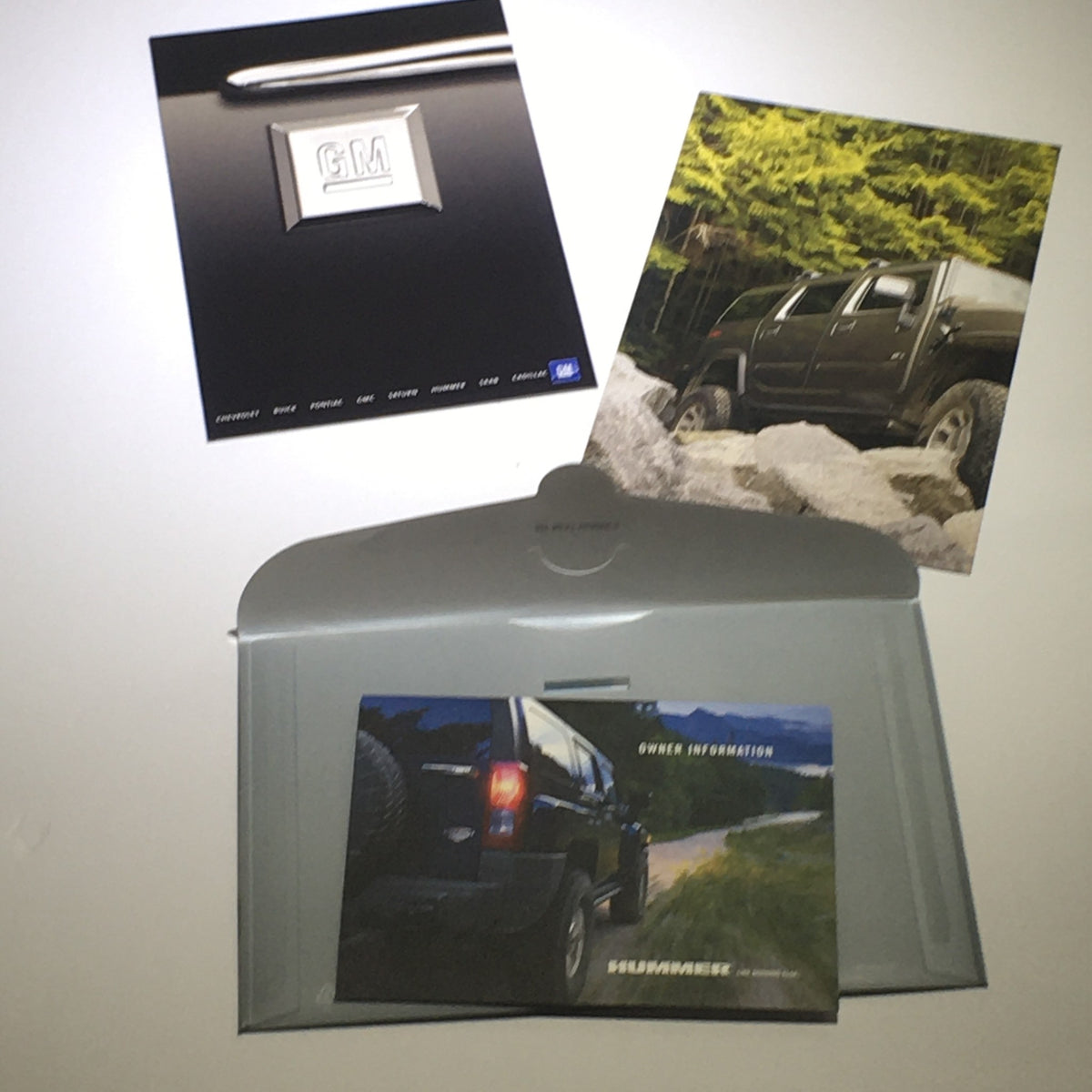 2008 Hummer H3 SUV Dealership Car Auto Brochure Catalog featuring GM logo and Hummer owner information, presented in a protective sleeve.