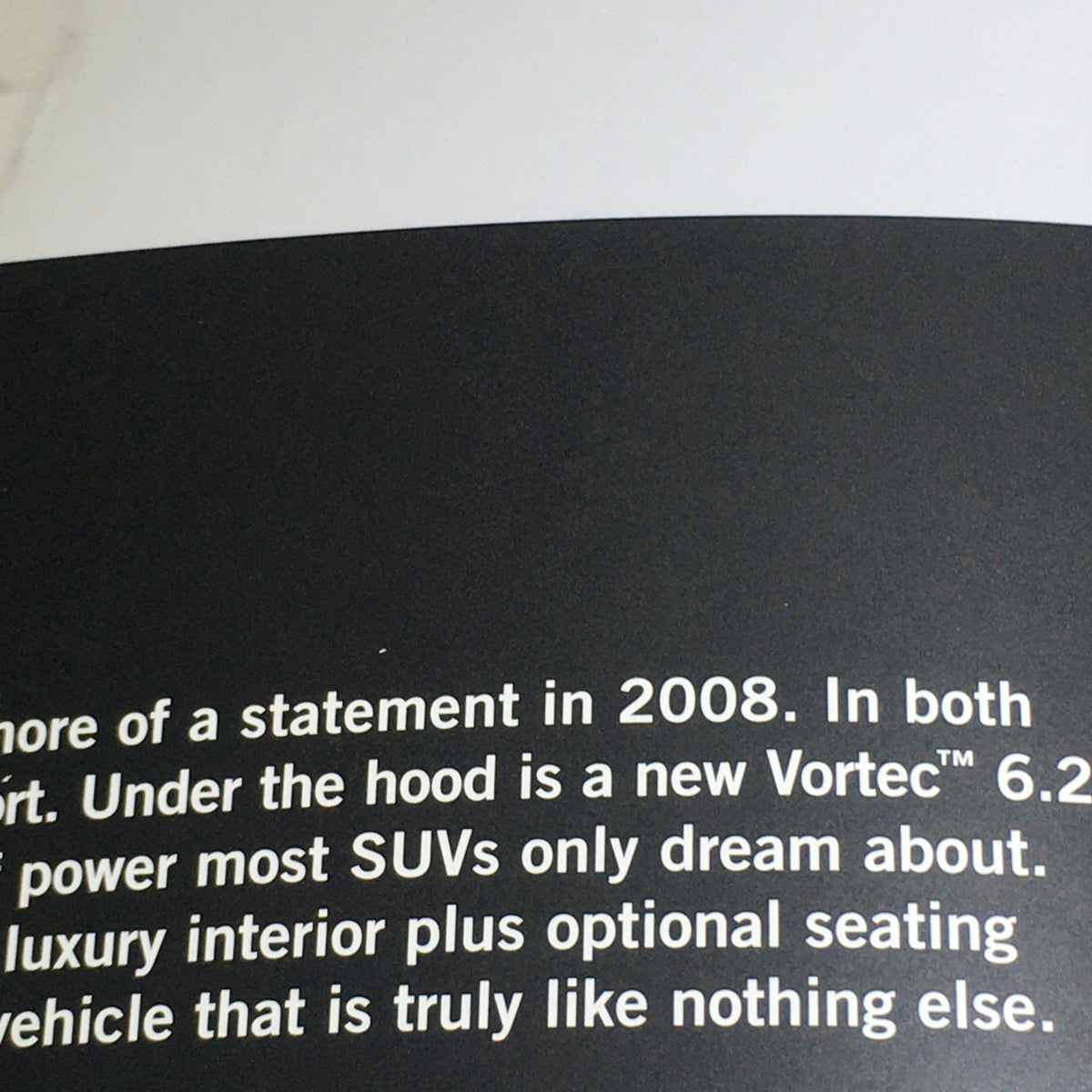 Close-up of the text from the 2008 Hummer H3 SUV Dealership Car Auto Brochure Catalog, highlighting the vehicle's Vortec 6.2-liter engine and luxury interior features.