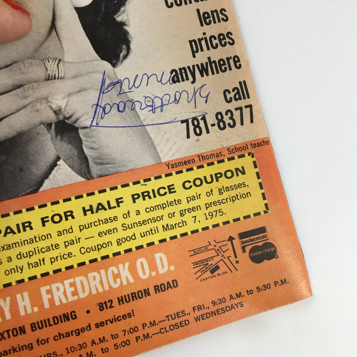 The back cover of The Cleveland Press TV Showtime Guide February 28 1975, featuring a half-price coupon advertisement for eyeglasses services alongside handwritten notes, reflecting vintage advertising style.