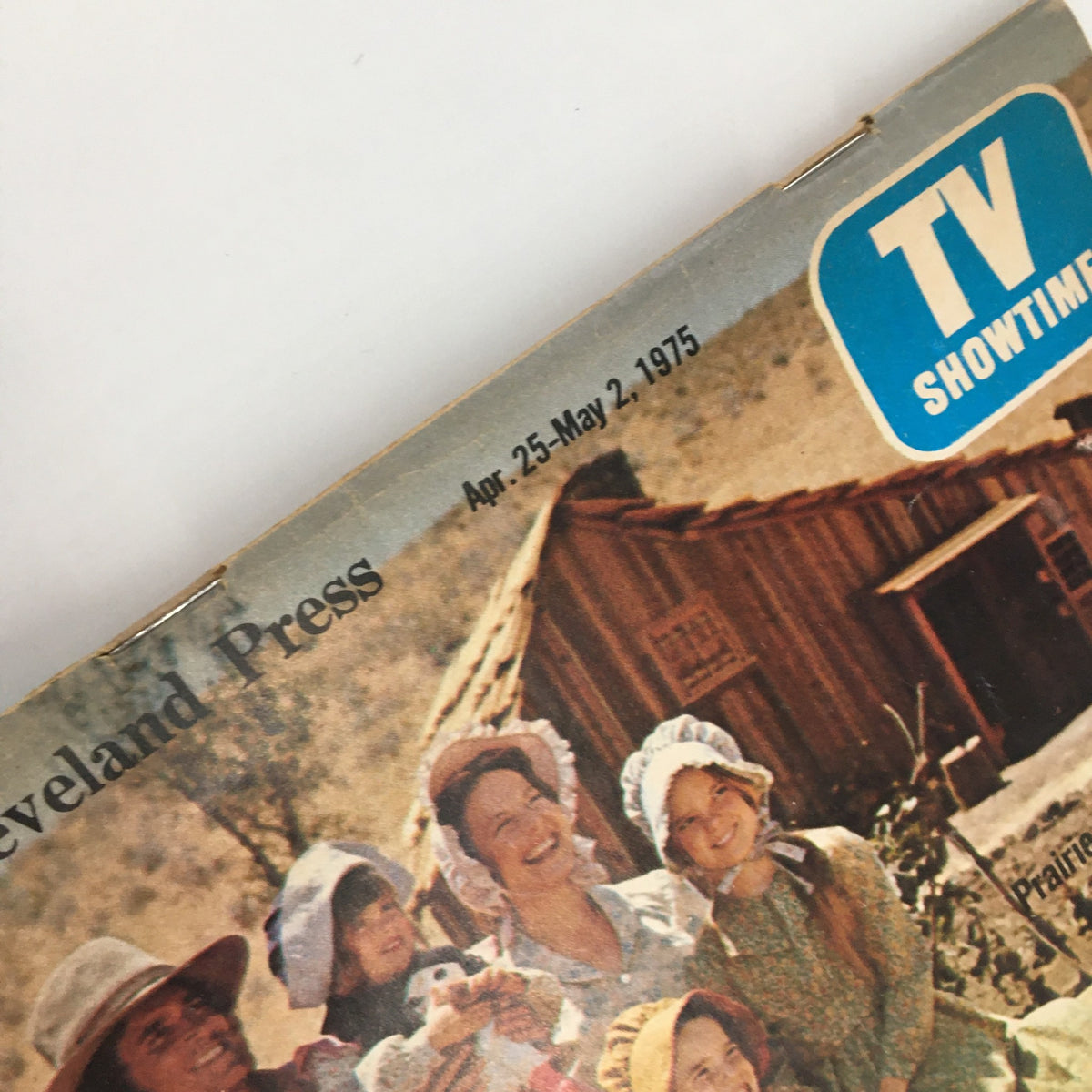Cover image of The Cleveland Press TV Showtime Guide from April 25, 1975, featuring a scene with characters in period costumes, showcasing a vintage design associated with iconic television moments.