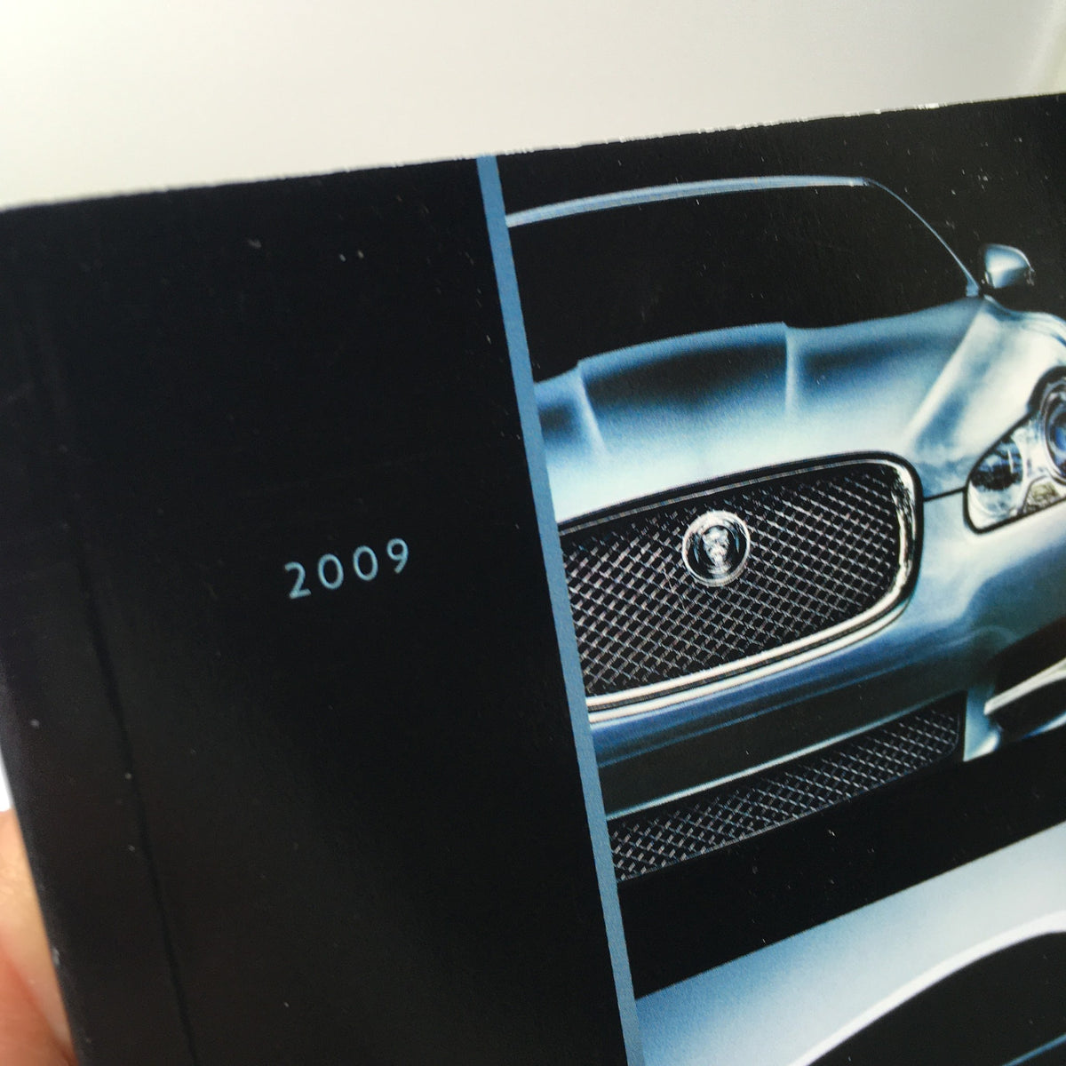 Close-up of the 2009 Jaguar Supercharged Dealership Car Auto Brochure Catalog showcasing the year 2009.