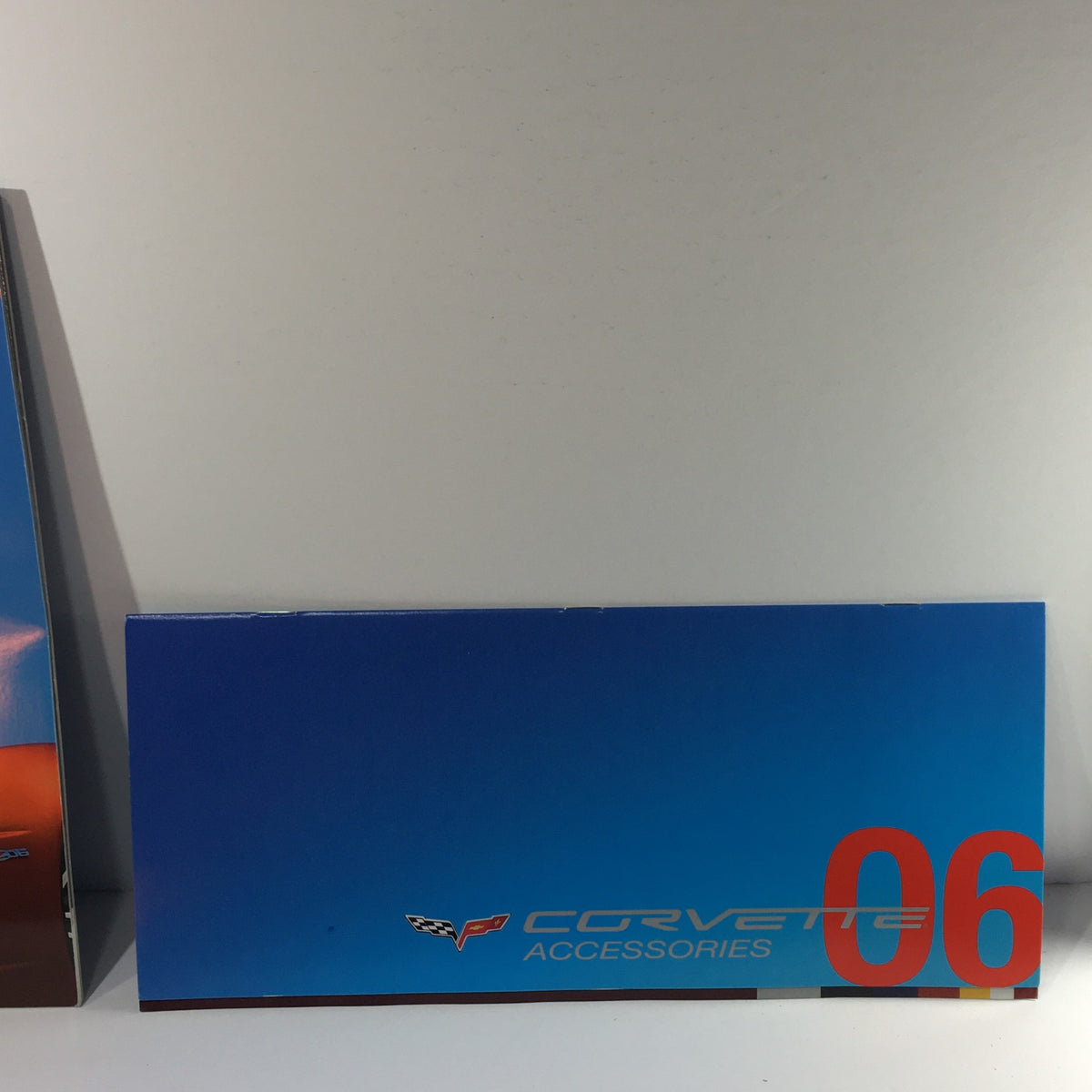 Inside view of the 2006 Chevrolet Corvette HP 505 Accessories Dealership Car Auto Brochure Catalog featuring the ‘06 Corvette Accessories title in bold with a blue background.