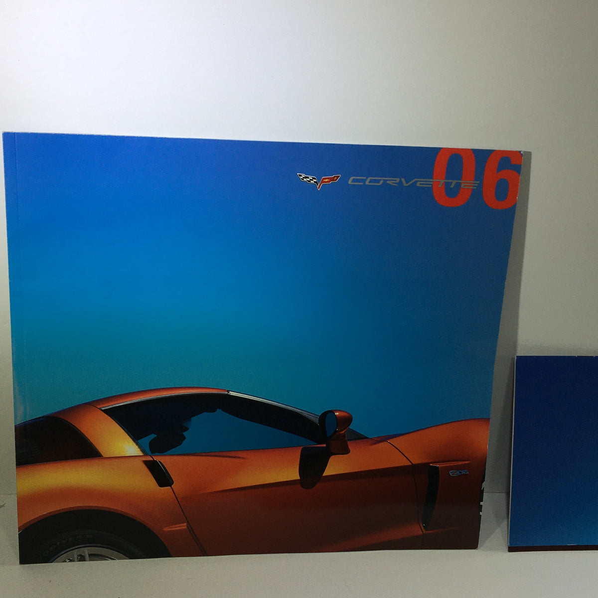 2006 Chevrolet Corvette HP 505 Accessories Dealership Car Auto Brochure Catalog cover featuring an orange Corvette against a blue sky.