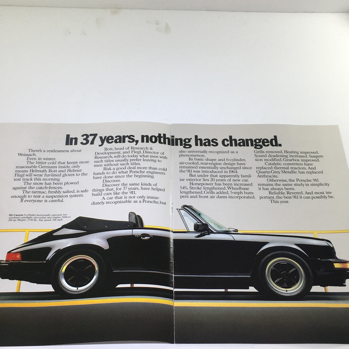 Inside spread of the 1985 Porsche 911 Carrera & 356-001 Dealership Car Auto Brochure Catalog highlighting the evolution of the Porsche design over 37 years with text detailing features and improvements.