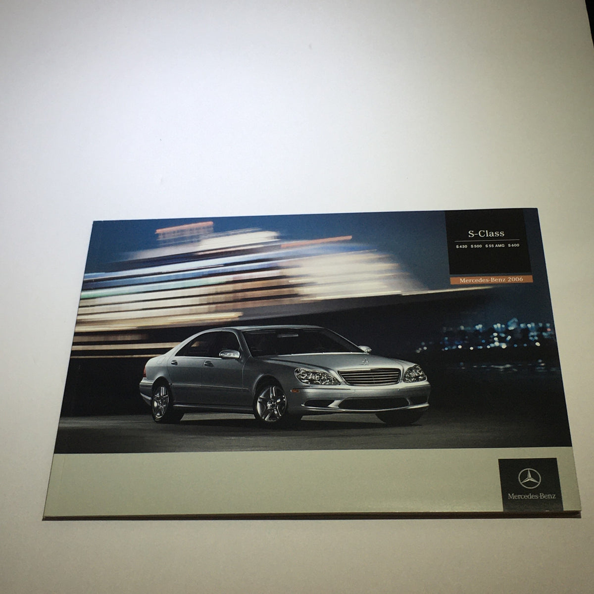 2006 Mercedes-Benz S-Class 430 500 AMG 600 Dealership Car Auto Brochure Catalog featuring a sleek silver sedan against a city backdrop.