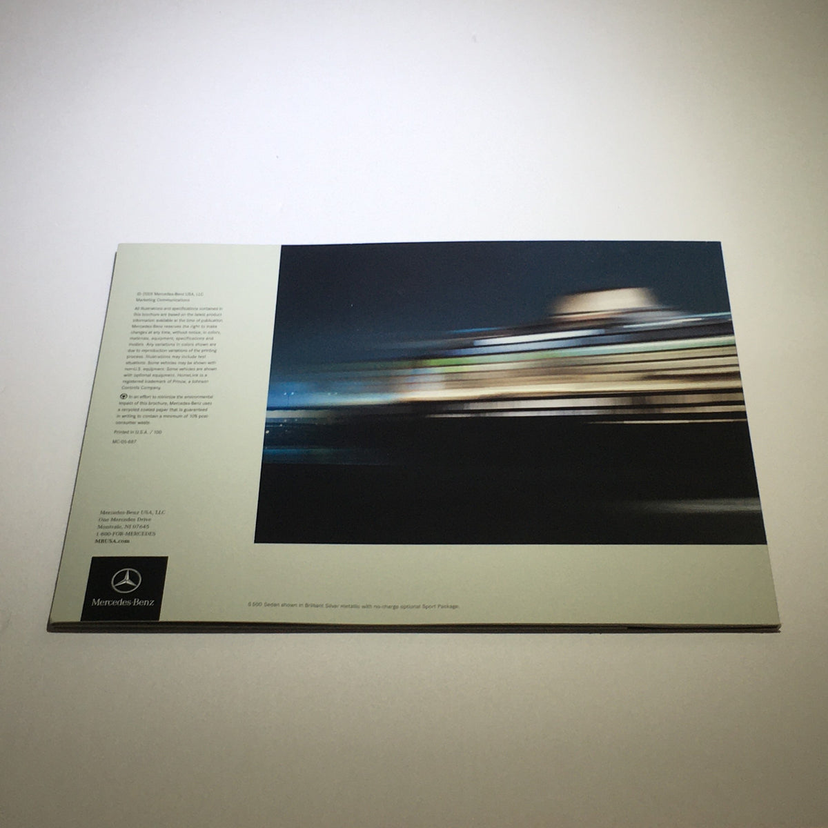 Back cover of the 2006 Mercedes-Benz S-Class brochure showcasing a dynamic image with dealership information.