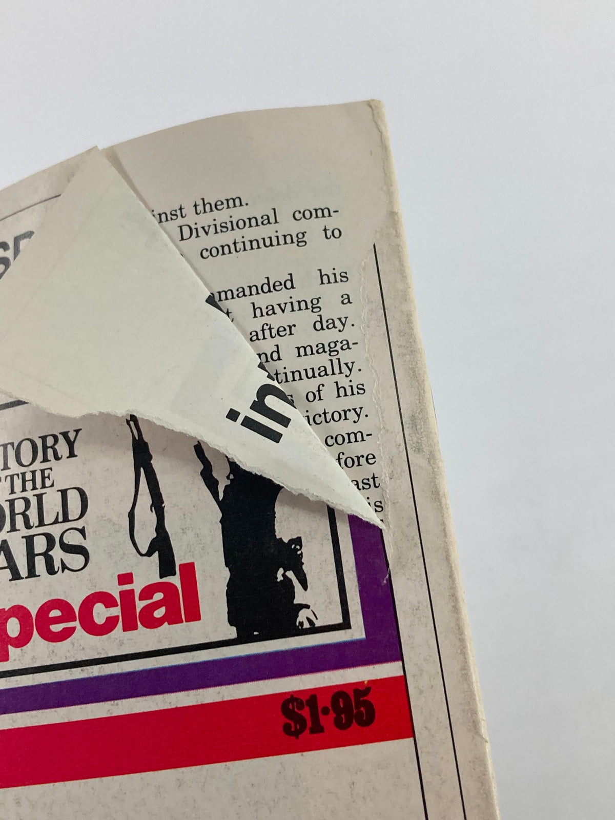 Detail of the magazine cover for 'History of the Second World War Part 82: Iwo Jima The Bloodiest Fight' showing a price tag and a corner wear.