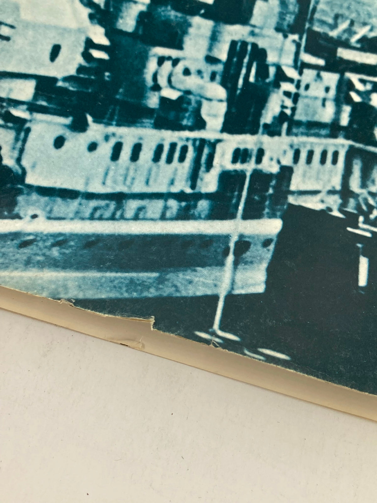 Close-up image of a vintage magazine page featuring a navy ship, from the 1974 issue titled 'History of the Second World War Part 43: Adolf Hitler Scrap the Fleet.' This image highlights the wear and tear typical of vintage publications.