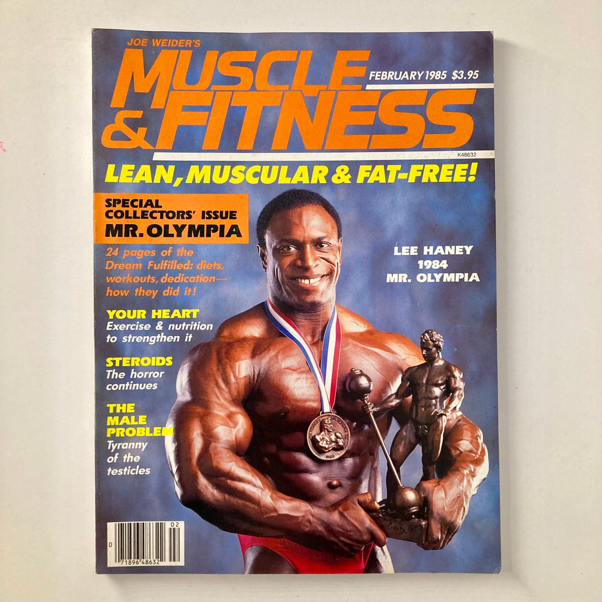 Cover of Joe Weider's Muscle & Fitness Magazine February 1985 featuring Lee Haney as Mr. Olympia, showcasing his impressive physique along with highlights of bodybuilding content and related fitness topics.