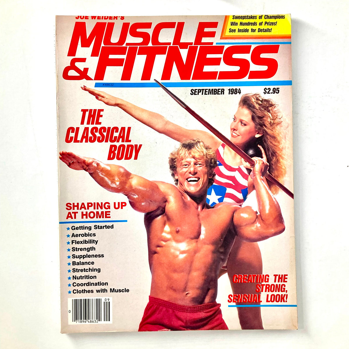Muscle & Fitness Magazine September 1984 cover featuring Bruce Jenner and Linda Thompson, showcasing a muscular man in red shorts and a woman in a swimsuit, highlighting fitness themes like 'The Classical Body' and workout tips.