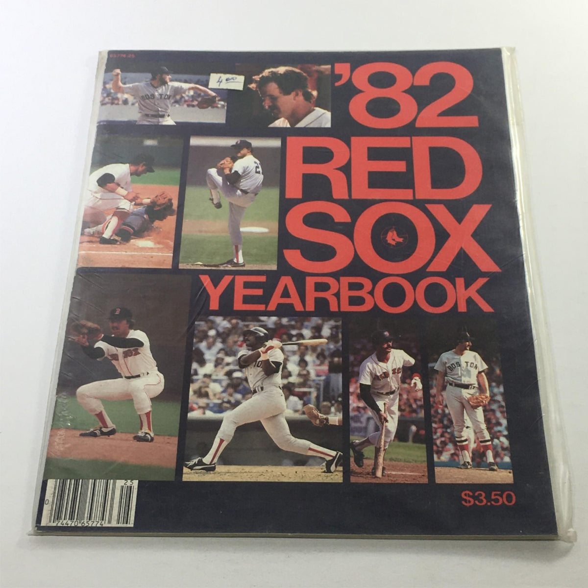 Cover of the 1982 Red Sox Yearbook featuring iconic players and the bold title '82 Red Sox Yearbook. Highlights include images of Carl Yastrzemski, Dwight Evans, Jerry Remy, and Jim Rice.