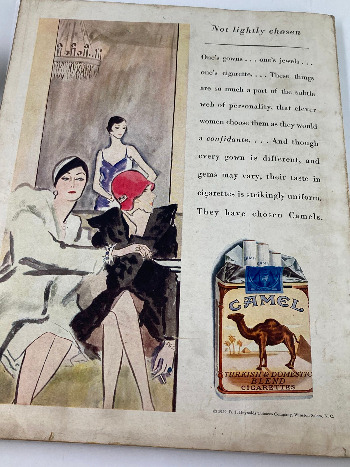 Back cover of VTG Vogue Magazine June 8 1929 displaying an advertisement for Camel cigarettes, illustrated with stylish women, reflecting the fashion trends of the 1920s.